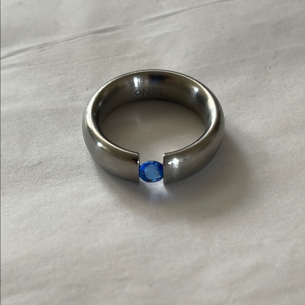 TeNo Elegant Stainless Steel Ring with Suspended Sapphire